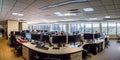 Panorama view of empty call center operator workspace. Generative AI Royalty Free Stock Photo