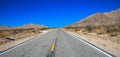 Scenery route through Death Valley National Park, lonesome road in the deser. Tourism and vacations concept, California United Sta Royalty Free Stock Photo