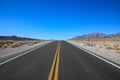 Scenery route through Death Valley National Park, lonesome road in the deser. Tourism and vacations concept, California United Sta Royalty Free Stock Photo