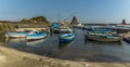 A panorama view of Fishermen`s boats against a background of Isole dei Ciclopi at Aci Trezza, Sicily