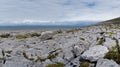 Panorama view of the glaciokarst coastal landscape of the Burren Coast in County Clare of western Ireland Royalty Free Stock Photo