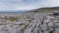 Panorama view of the glaciokarst coastal landscape of the Burren Coast in County Clare of western Ireland Royalty Free Stock Photo