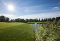 Panorama View of Golf Course with beautiful green field. Golf course with a rich green turf beautiful scenery. Royalty Free Stock Photo