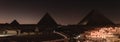 Panorama View of The Great Pyramids of Giza at Night Royalty Free Stock Photo