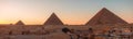 Panorama View of The Great Pyramids of Giza at Sunset Royalty Free Stock Photo