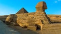 A panorama view of the Great Sphinx at Giza, Egypt silhouetted in the evening sunshine Royalty Free Stock Photo