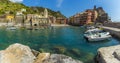 A panorama view from the harbour wall towards the picturesque village of Vernazza