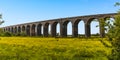 A panorama view of the Harringworth railway viaduct from Seaton, UK