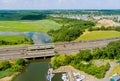 Panorama view on highway traffic of cars driving on freeway across the bridge