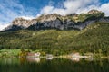 Panorama view Hintersee Lake Alps mountain beautiful reflection tree meadow house in background, clear water, national park, Royalty Free Stock Photo