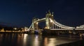 Panorama view of iconic illuminated famous Tower Bridge over Thames river in London England UK Great Britain at night Royalty Free Stock Photo