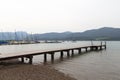 Panorama view of lake Tegernsee, jetty, sailboats and mountains in Gmund, Germany Royalty Free Stock Photo