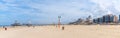 Panorama view of the long sandy beach in the Dutch seaside resort of Scheveningen near The Hague