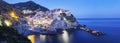 panorama view of Manarola village one of Cinque Terre at night in La Spezia, Italy Royalty Free Stock Photo