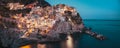panorama view of Manarola village one of Cinque Terre at night in La Spezia, Italy Royalty Free Stock Photo