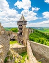 Panorama view of medieval castle Helfstyn, Czech Republic. Detail of tower with stone walls at ancient fortress. Sunny day, blue
