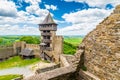 Panorama view of medieval castle Helfstyn, Czech Republic. Detail of tower with stone walls at ancient fortress. Sunny day, blue