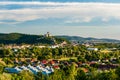 Panorama view of medieval newly restored Trencin castle over the Vah river with view of Trencin city in golden sunny summer day Royalty Free Stock Photo