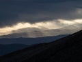 Panorama view of mountain range silhouette layers haze dust fog clouds at Misti volcano Arequipa Peru Andes