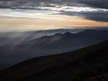 Panorama view of mountain range silhouette layers haze dust fog clouds at Misti volcano Arequipa Peru Andes