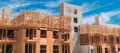 Panoramic apartment building under construction with multilevel garage, elevator shaft near Dallas Royalty Free Stock Photo