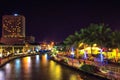 Panorama View of night near river of Melaka river with wheel and bridge.