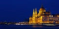 Panorama view in the night scene with building of Hungarian parliament at Danube river in Budapest city Royalty Free Stock Photo