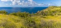 A panorama view out to sea from the fortress ruins at the Blockhouse viewpoint on the coast of Antigua Royalty Free Stock Photo