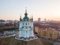 Aerial view of Podol and St Andrew`s Church on the sunset in Kiev city
