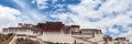 Panorama view of Potala Palace in summer sunny day, winter palace of Dalai Lama, blue sky and cloud in background, Lhasa Lasa of Royalty Free Stock Photo