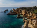 Panorama view of Praia do Submarino Algarve cliff coast sand beach holiday vacation spot in Portimao Portugal Europe