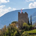 Panorama view on Pulverturm Powder Tower of the old castle inside Valley and Alps of Meran Landscape. Merano, Province Bolzano,