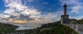 Panorama view of the Punta Nariga lighthouse during a beautiful sunset on the coast of Galicia Royalty Free Stock Photo