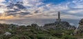 Panorama view of the Punta Nariga lighthouse during a beautiful sunset on the coast of Galicia Royalty Free Stock Photo