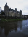 Panorama view reflection of medieval Castle Chateau de Josselin in river Oust Morbihan Brittany France Europe Royalty Free Stock Photo