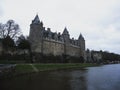 Panorama view reflection of medieval Castle Chateau de Josselin in river Oust Morbihan Brittany France Europe Royalty Free Stock Photo