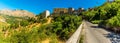 A panorama view of the road leading up to the hilltop village of Petralia Sottana in the Madonie Mountains, Sicily Royalty Free Stock Photo