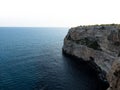 Panorama view of rocky cliff coast shore turquoise mediterranean sea water Cala Llombards Mallorca Balearic Spain Royalty Free Stock Photo