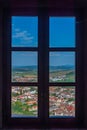 Panorama view of Romanian town Rupea thorugh window of the citad Royalty Free Stock Photo