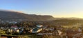Panorama view of a rural area by the hills during sunrise