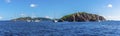 A panorama view sailboats moored of the Pelican Island and the Indian Islets off the main island of Tortola