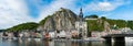 Panorama view of the small town of Dinant on the Maas river with the historic citadel and cathedral on the river front