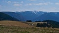 Panorama view of snow-capped Feldberg (1,493 m), the largest peak of low mountain range Black Forest, Germany.