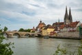 Panorama view of the stone bridge and historical old town of Regensburg or Ratisbon on river side of Danube Royalty Free Stock Photo