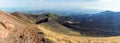 Panorama view of a string of secondary cones stretching down from the summit of Mount Etna, Sicily Royalty Free Stock Photo