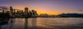 Panorama view of Sunset over the Harbor and the Sails of Canada Place at the Vancouver Waterfront Royalty Free Stock Photo