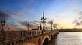 Panorama view in sunset sky scene of the Pont de pierre at sunset and winery region Bordeaux, France Royalty Free Stock Photo