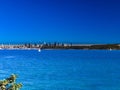 Panorama view of Sydney Harbour with the CBD in the background NSW Australia. Nice blue skies, clear turquoise waters. Royalty Free Stock Photo