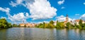 Panorama view of Telc city, Czech Republic. Historical castle above the lake. UNESCO heritage. Summer day, blue sky with clouds Royalty Free Stock Photo