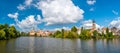 Panorama view of Telc city, Czech Republic. Historical castle above the lake. UNESCO heritage. Summer day, blue sky with clouds Royalty Free Stock Photo